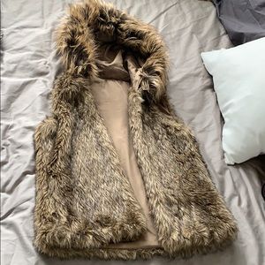 Fur vest with hood